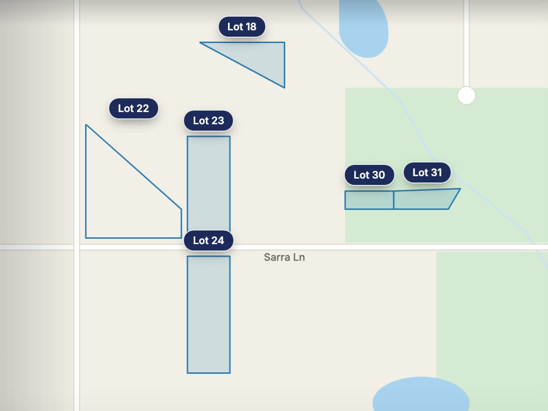 A map with the builder’s acreage lots outlined in blue and labeled by lot number